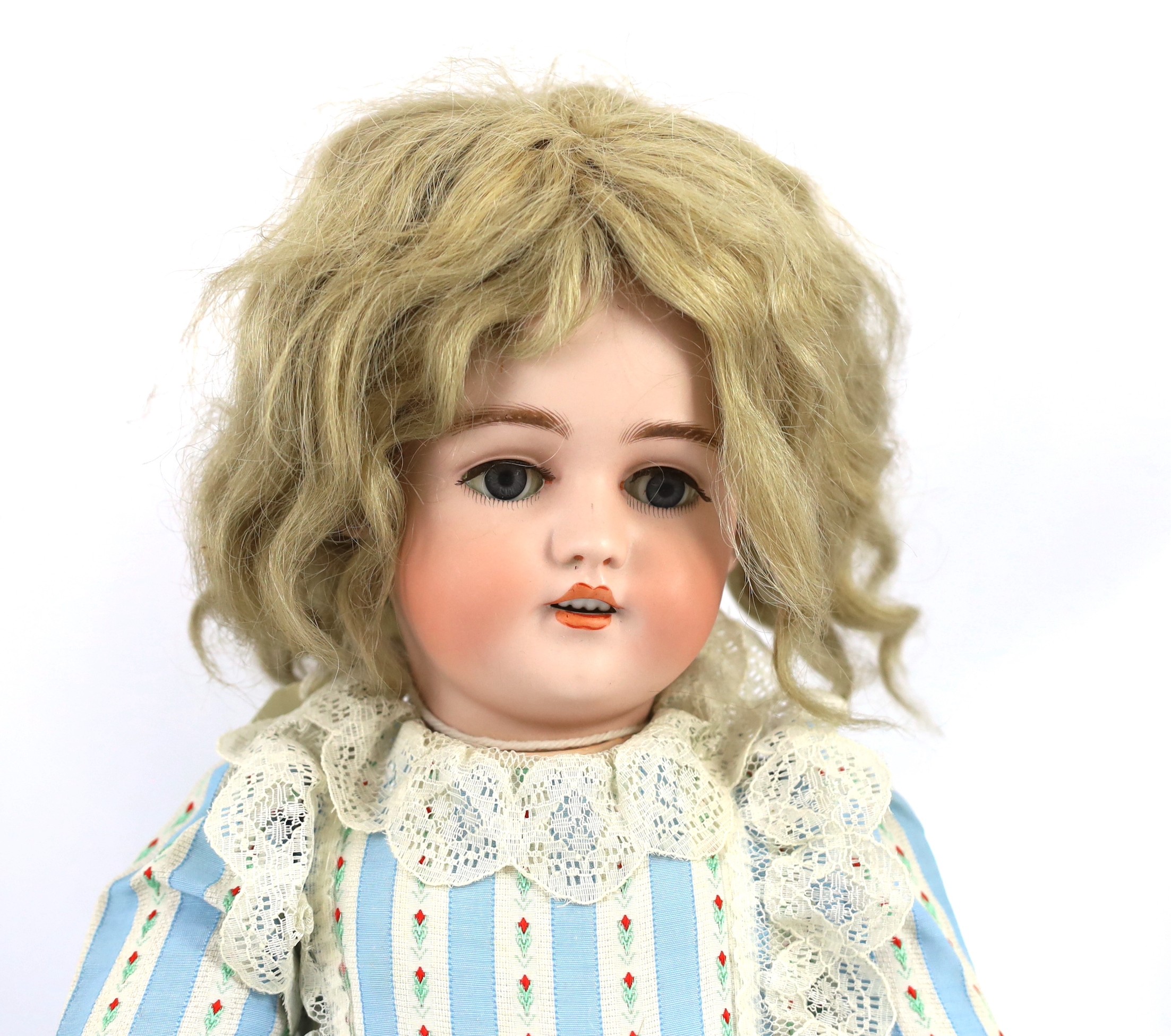 A Simon & Halbig bisque doll, German, circa 1892, impressed 1079 11½, with open mouth and moulded - Image 2 of 3