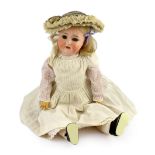 A Schoenau & Hoffmeister bisque doll, German, circa 1909, impressed 1909 7½, with open mouth and
