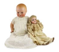 A Heinrich Handwerck bisque doll, German, circa 1900, impressed 79 10, with open mouth and upper