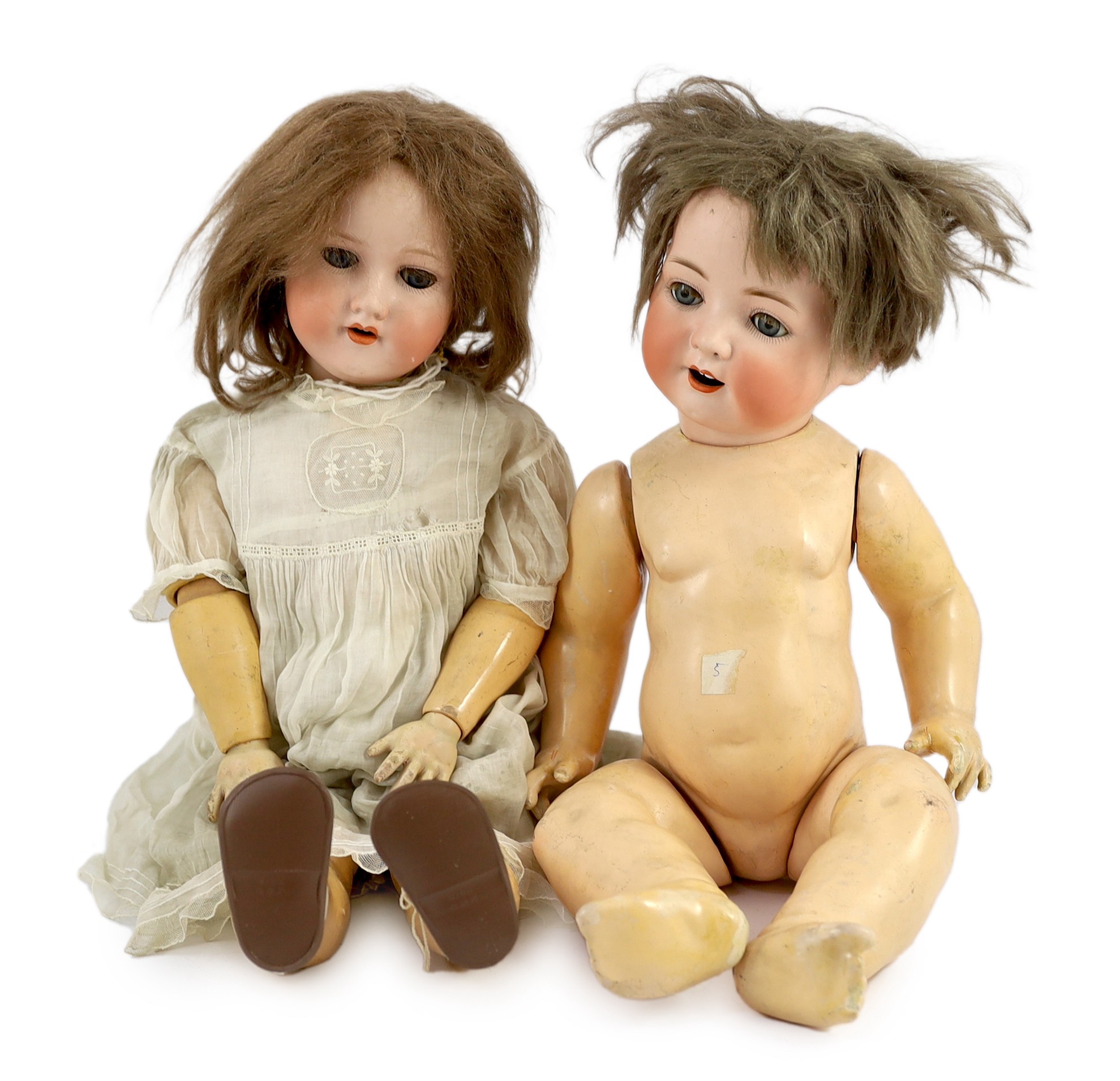 An Armand Marseille bisque doll, German, circa 1912, impressed 390n, A 9 M, with open mouth and