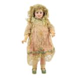 A fine and rare Jumeau pressed bisque two-faced doll, French, circa 1885, with crying and laughing