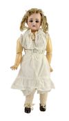 A Simon & Halbig bisque doll, German, circa 1888, impressed SH5 949, with open mouth and upper