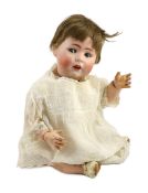 A Cuno and Otto Dressel Jutta bisque doll, German, circa 1914, impressed 50 Jutta 1914 12, with open