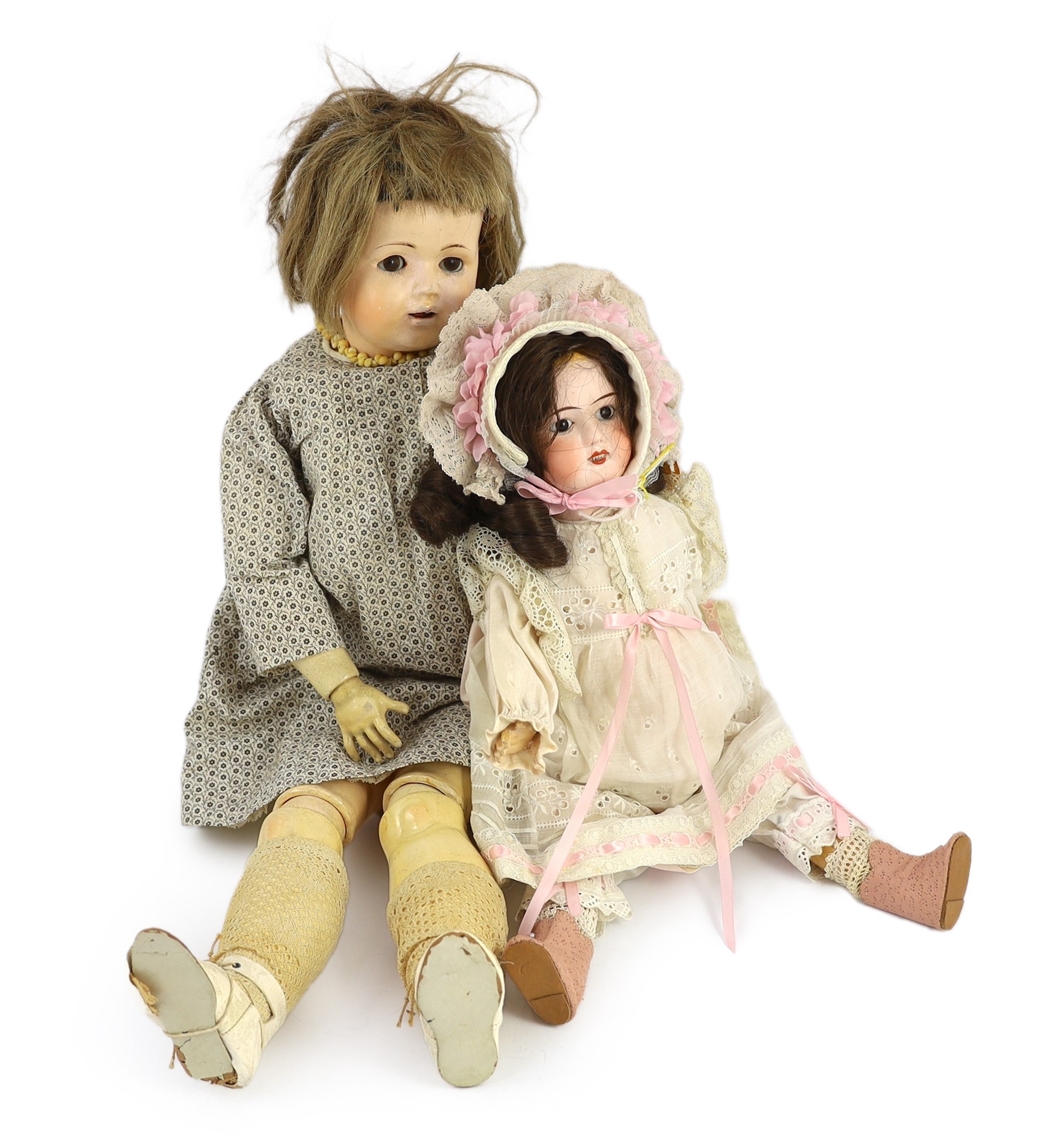 An unusual composition headed doll, German, circa 1900, indistinctly impressed 46, with open