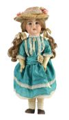 A bisque fashion doll, French, circa 1900, impressed 8, with open mouth, fixed glass eyes and