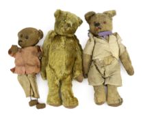 An early 20th century German Teddy bear, mohair plush and boot-button eyes, 12in., and two other