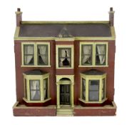 'Rocking Villa': A Victorian furnished dolls’ house, circa 1880, modelled as a double-fronted