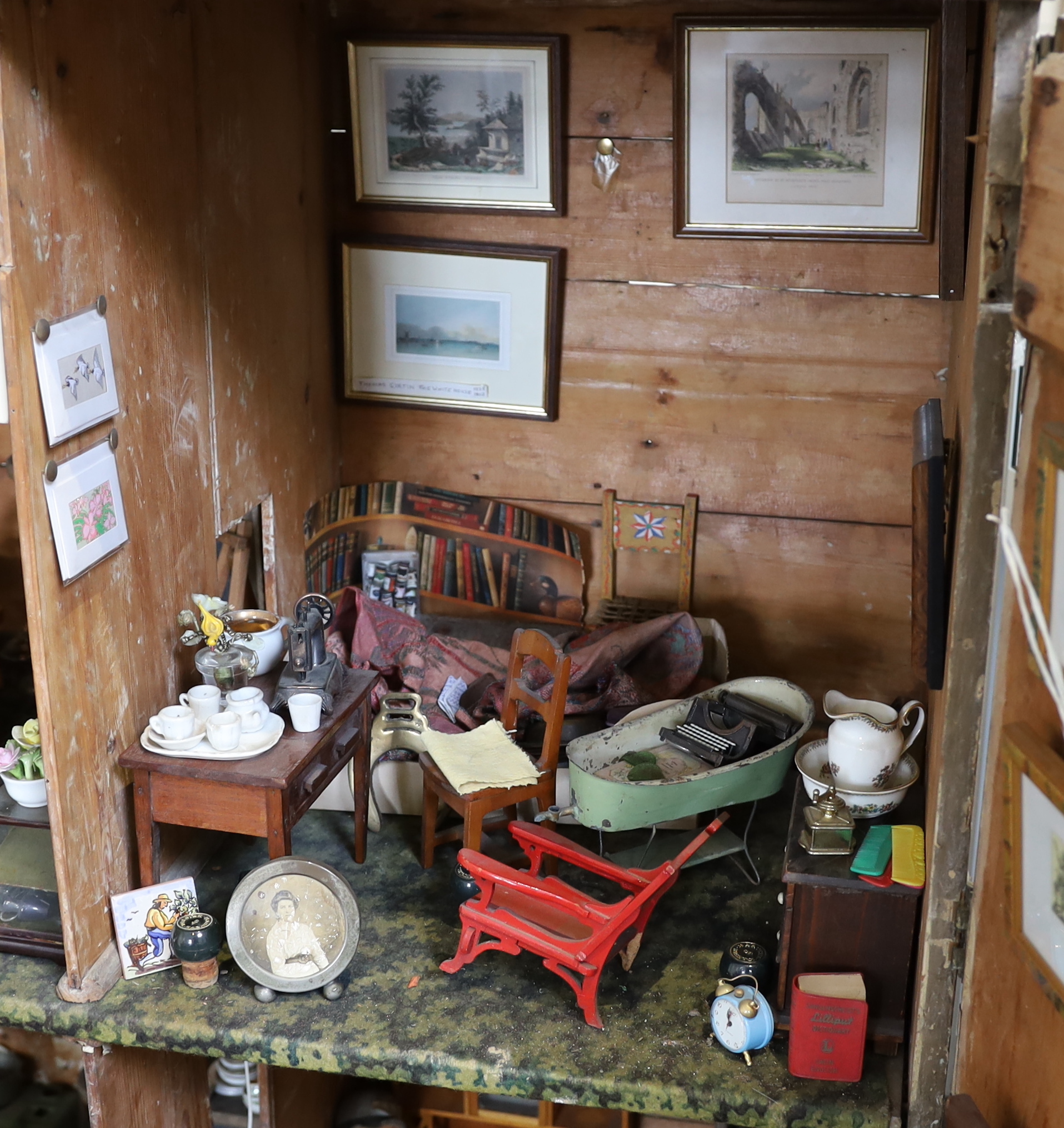 A very large English dolls’ house, circa 1840-1850, with a central panelled door and large windows - Image 6 of 10