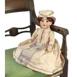A Kammer & Reinhardt / Simon & Halbig bisque character doll, German, circa 1911, impressed 117n