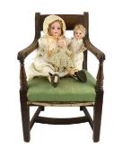 A Max Oscar Arnold bisque doll, German, circa 1920, impressed MOA 200 Welsch 2½, with open mouth and