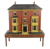'Ednaville': A fine fully furnished Victorian dolls' house, circa 1880-1900, modelled as handsome