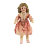 A Simon & Halbig S. & C. bisque doll, German, circa 1895, impressed 43, with open mouth and upper