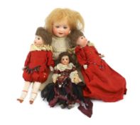 A pair of Recknagel bisque headed dolls, German, circa 1900, one impressed R 16/0 A, both with