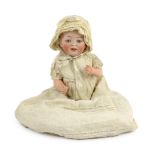 A J.D. Kestner bisque character doll, German, circa 1912, impressed JDK 12, domed head with open /