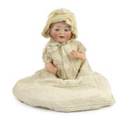 A J.D. Kestner bisque character doll, German, circa 1912, impressed JDK 12, domed head with open /