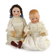 Two Armand Marseille bisque dolls, the first impressed 390n A. 6½ M. with weighted brown glass eyes,
