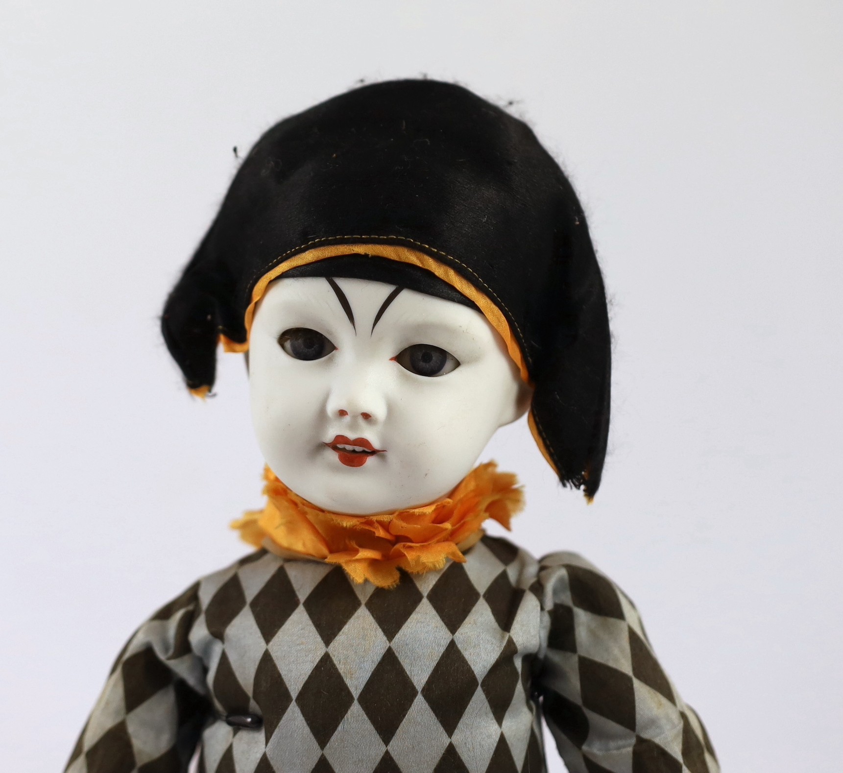 An SFBJ Harlequin clown, French, circa 1925, impressed 301 5, the white bisque head with open - Image 2 of 2