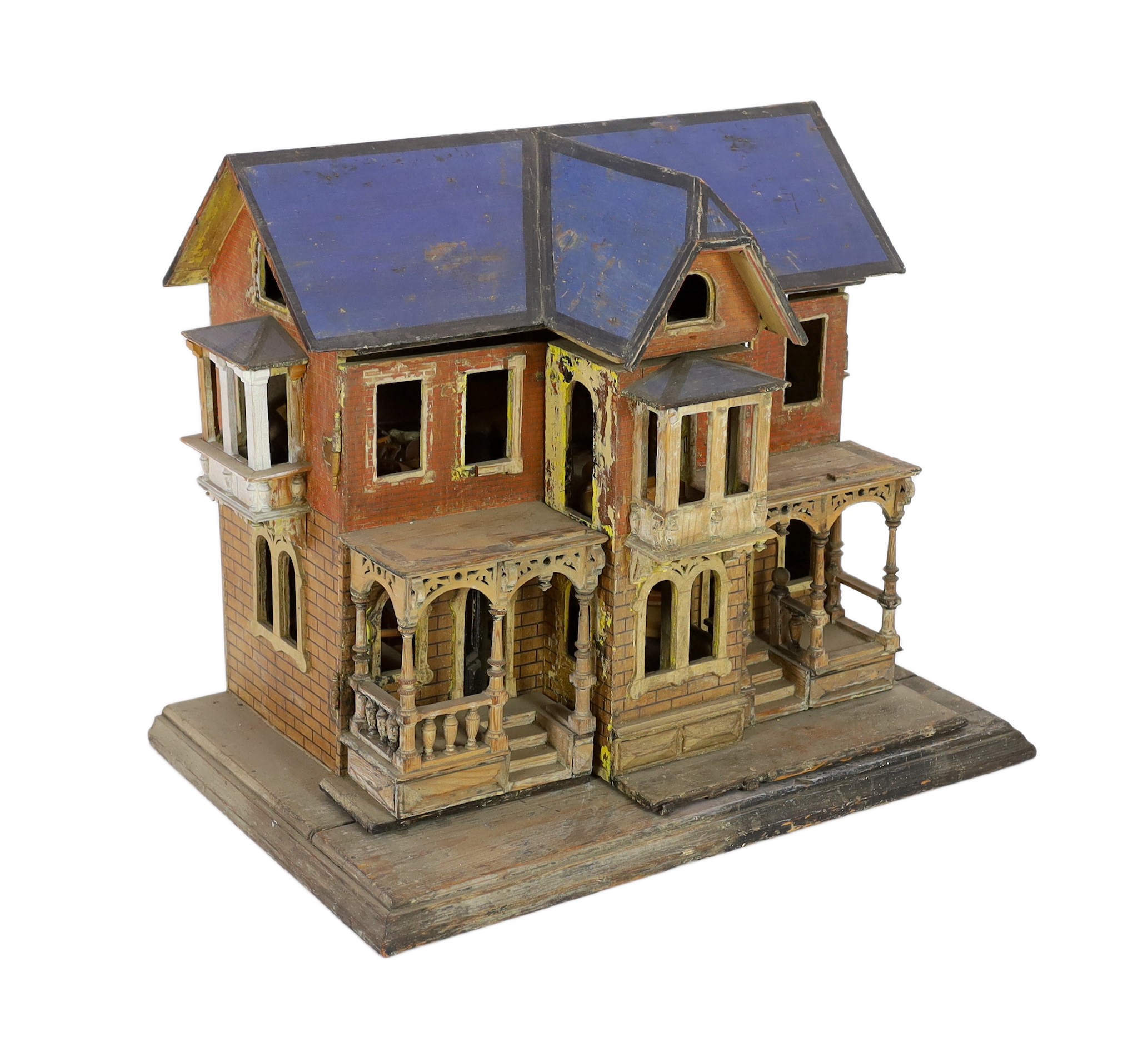 A Moritz Gottschalk ‘blue roof’ furnished dolls’ house, c.1893-94, modelled as an elaborate two