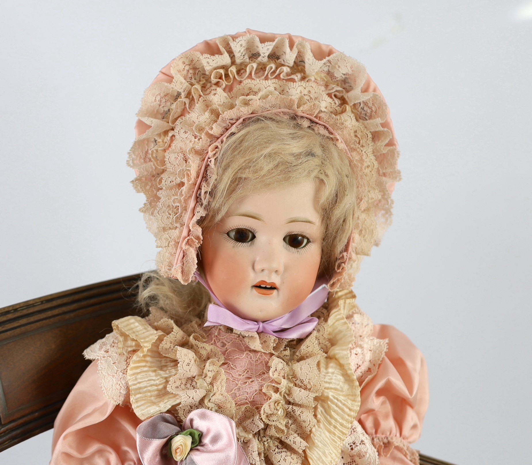 A Heubach Koppelsdorf bisque doll, German, circa 1914, impressed 250/5, with open mouth and upper - Image 2 of 3
