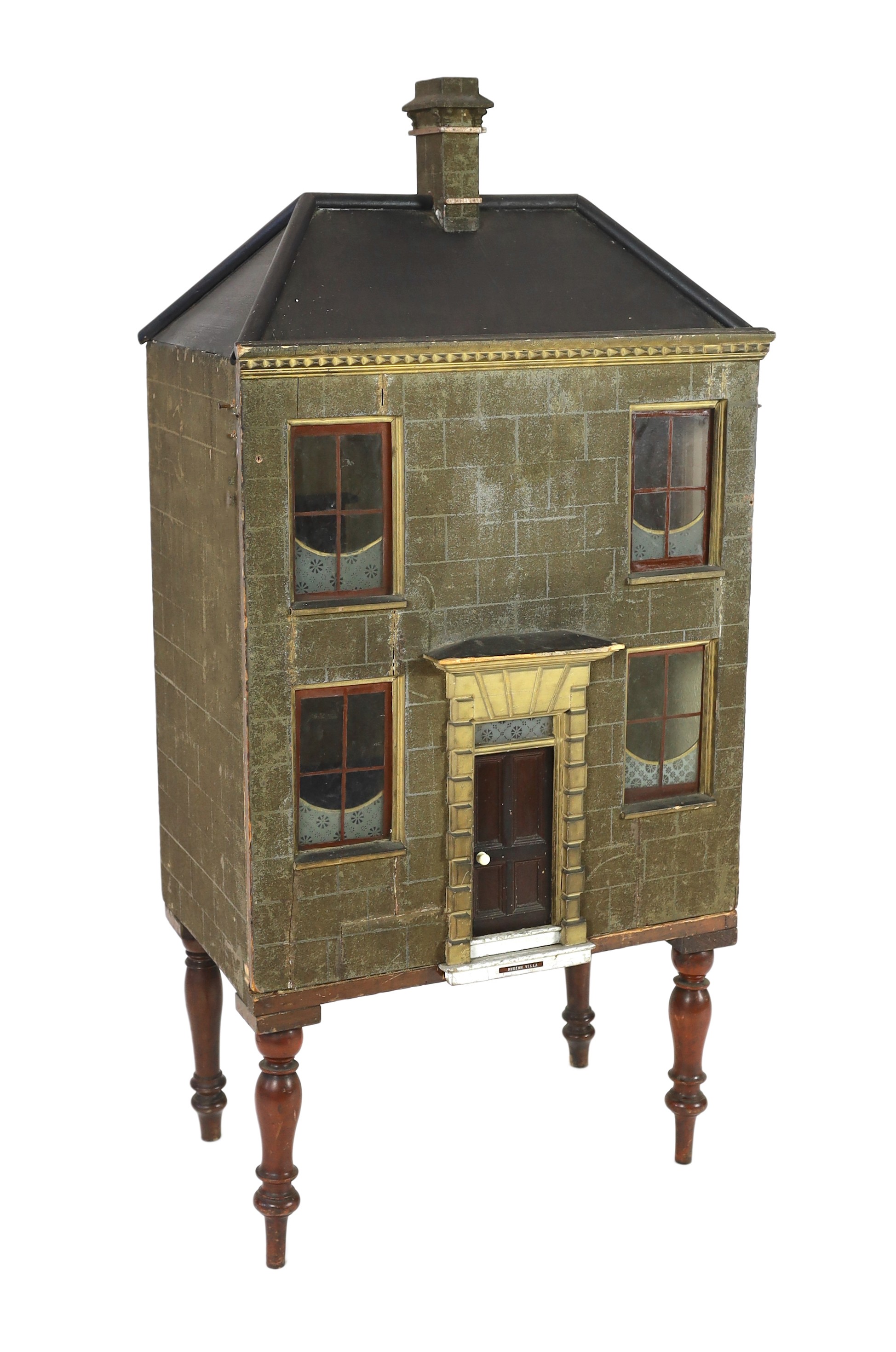 'Museum Villa': A mid 19th century furnished English dolls’ house, the fine facade with a heavily