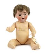 A Schutzmeister & Quendt bisque character doll, German, circa 1920, impressed 201, entwined SQ 6,