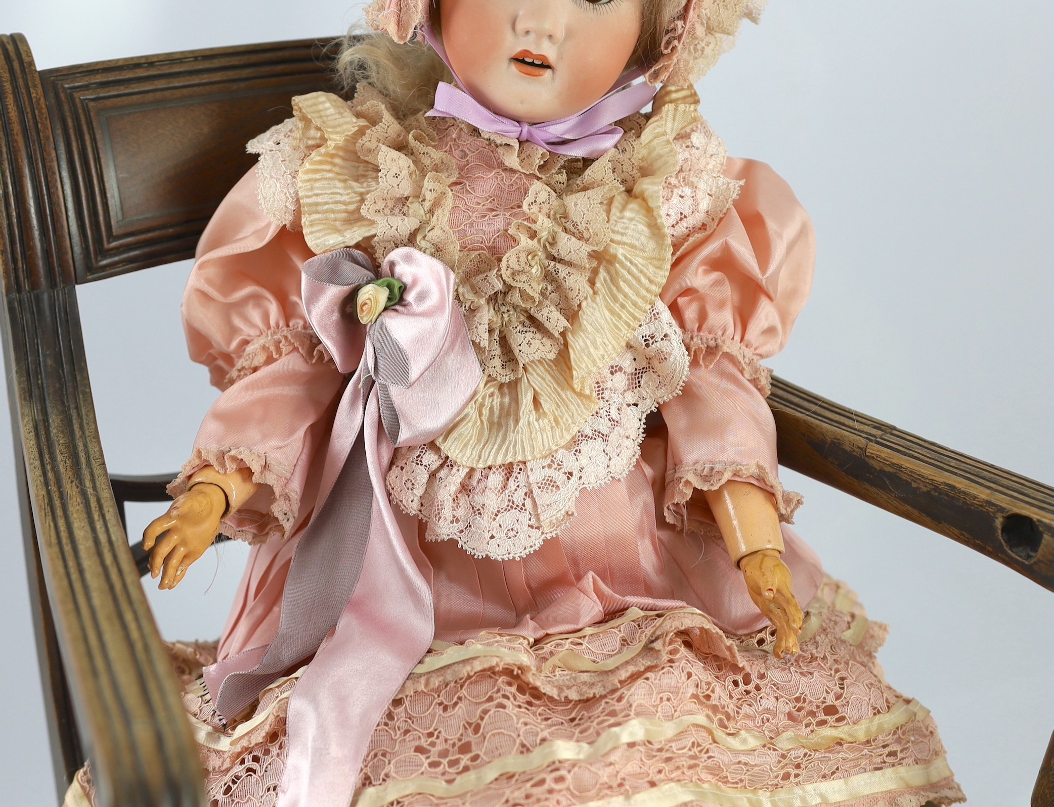 A Heubach Koppelsdorf bisque doll, German, circa 1914, impressed 250/5, with open mouth and upper - Image 3 of 3