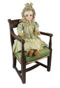A Jules Steiner Bourgoin bisque doll, French, circa 1880, impressed Sie C 0 and stamped in red