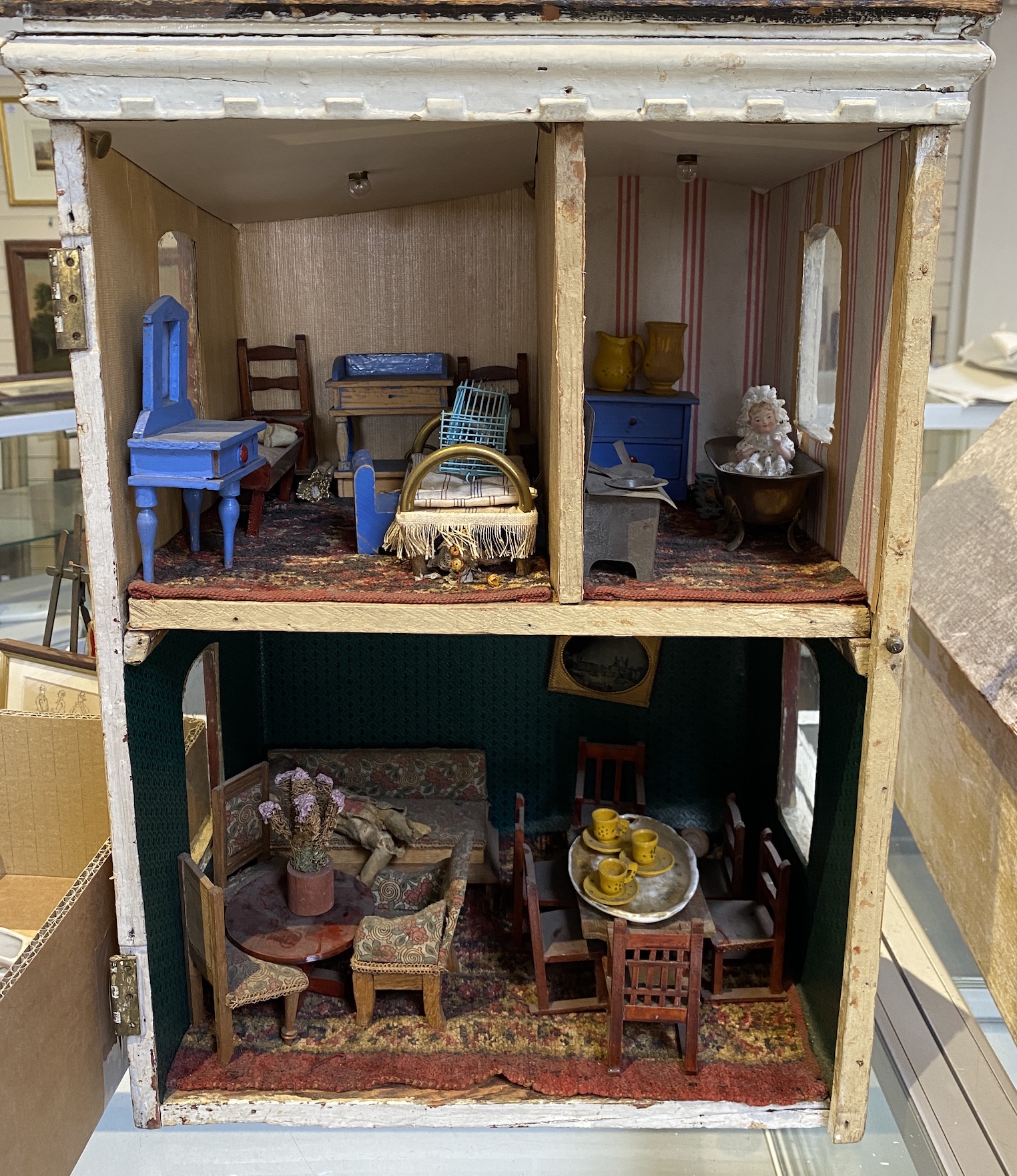 ‘Queens Lynn House’. A late 19th century home-made dolls' house, and contents - Image 3 of 6