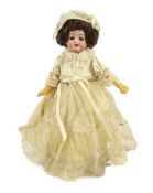 A bisque doll, probably by Gebruder Kuhnlenz, German, circa 1891, impressed 21-11/0, with open mouth