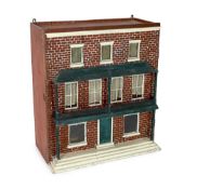 A Victorian furnished dolls’ house, circa 1890, of three floors, the brick facade with an attractive