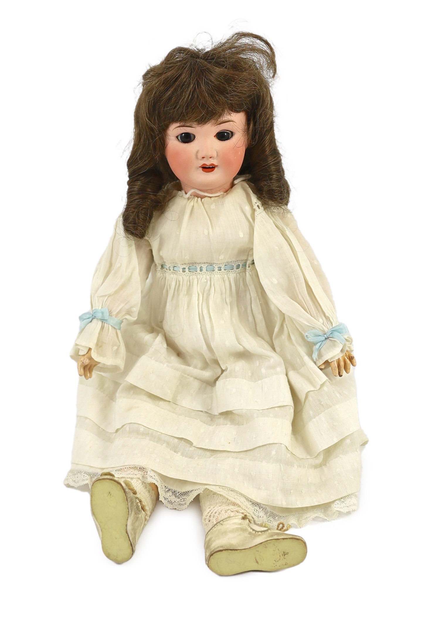An SFBJ bisque doll, French, circa 1925, impressed 301 4, with open mouth, upper teeth, weighted