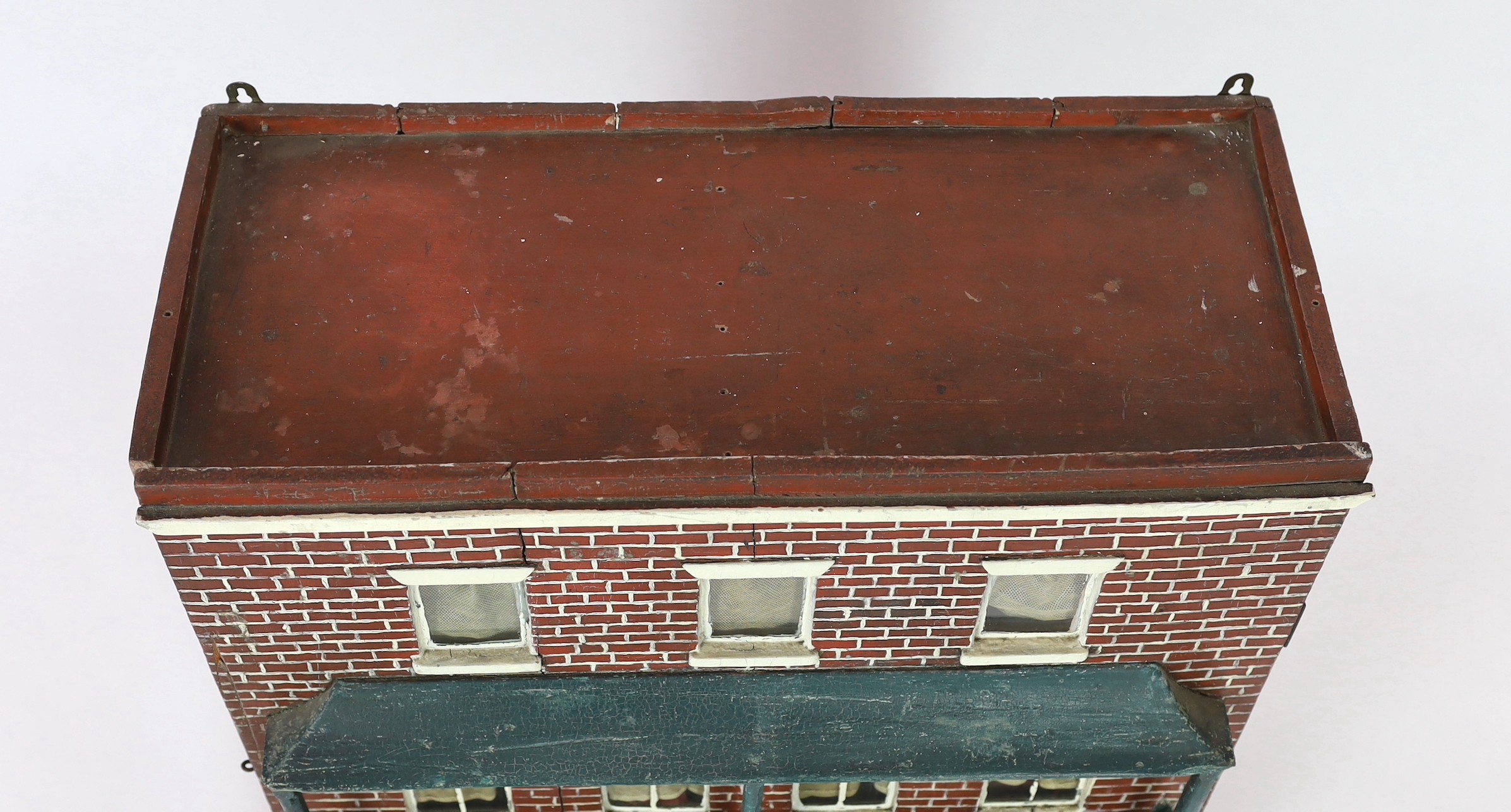 A Victorian furnished dolls’ house, circa 1890, of three floors, the brick facade with an attractive - Image 3 of 10