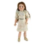 An S.F.B.J. talking bisque doll, French, circa 1900, mould 301/9 with weighted blue eyes, open mouth