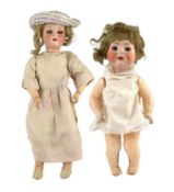 A C.M. Bergmann bisque doll, German, circa 1916, impressed C.M. Bergmann Walterhausen 1916 5, with