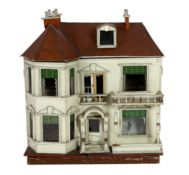 A G. and J. Lines furnished dolls’ house of 'Kits Koty' type, early 20th century, modelled as a