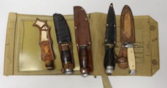 A group of five various knives