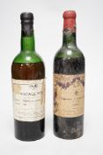 A bottle of Army and Navy stores 1960 vintage port and a bottle of Chateau Calon-Segur 1962