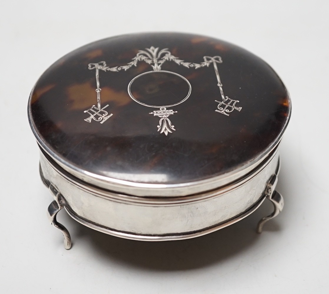 A George V circular silver and pique inlaid tortoiseshell trinket box, William Comyns, London, 1914,