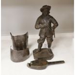 Two 17th century armour parts, together with a cast iron statue of Oliver Cromwell and southern