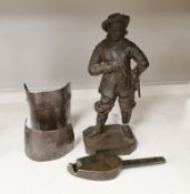 Two 17th century armour parts, together with a cast iron statue of Oliver Cromwell and southern