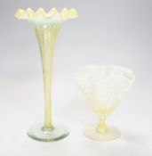 Two early 20th century vaseline glass vases, tallest 29cm