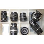 A large collection of SLR camera bodies and lenses, including Pentax, Tamron, etc. and other