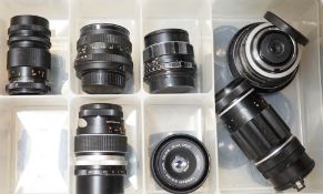 A large collection of SLR camera bodies and lenses, including Pentax, Tamron, etc. and other