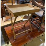 A faux bamboo caned butler's tray on folding stand, width 60cm, depth 43cm, height 68cm