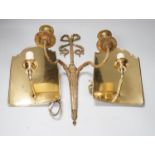 An 18th century style ribbon design brass two branch wall sconces and a pair of Dutch style brass
