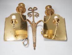 An 18th century style ribbon design brass two branch wall sconces and a pair of Dutch style brass