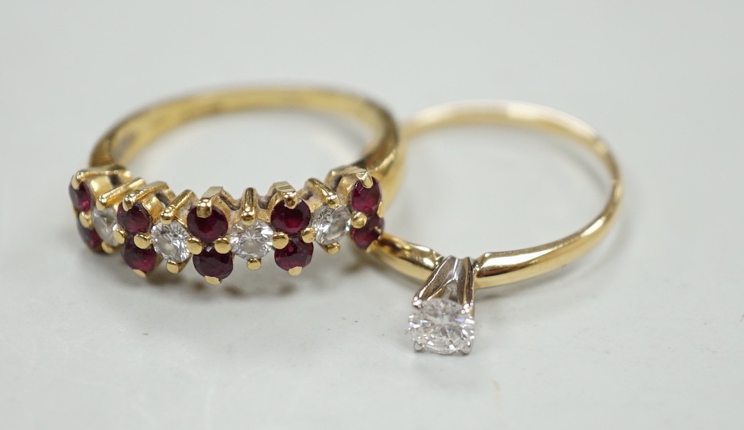 A modern 18ct gold, ruby and diamond cluster set half hoop ring, size L, gross weight 3.4 grams