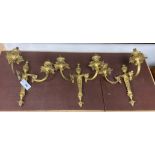 A set of three French rococo cast brass twin branch wall lights, height 36cm