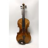 A Louis Lowendall Maggini violin, label inscribed and dated 1884, cased