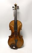 A Louis Lowendall Maggini violin, label inscribed and dated 1884, cased